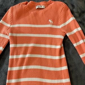 pink and white sweater